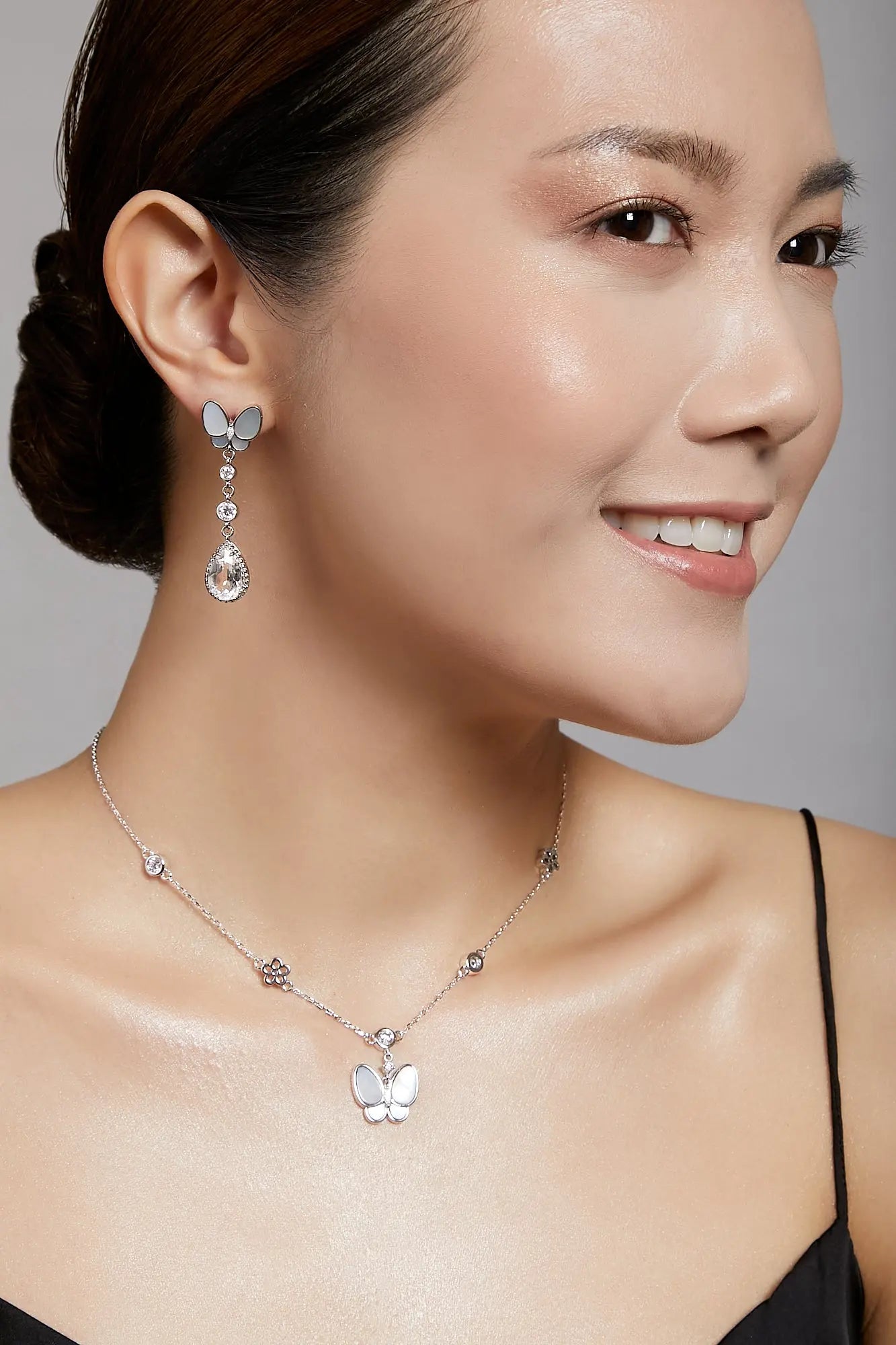 Butterfly Glamor Silver Dangling Earrings Dryden Jewelry