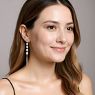 Bauhinia Blakeana Burlesque Rose Gold Dangling Pearl Earrings Dryden Jewelry